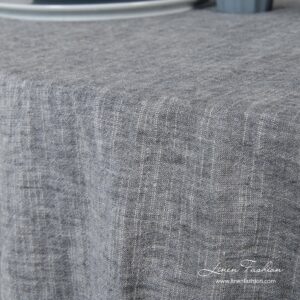 Round tablecloth made in dark grey and white melange colors