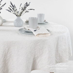 Round off white linen cotton tablecloth, washed