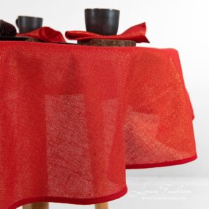 Round red linen tablecloth Donna with piping around.