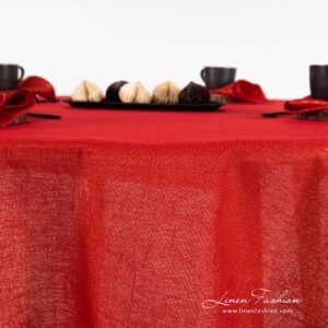 Round red linen tablecloth Donna with piping around.