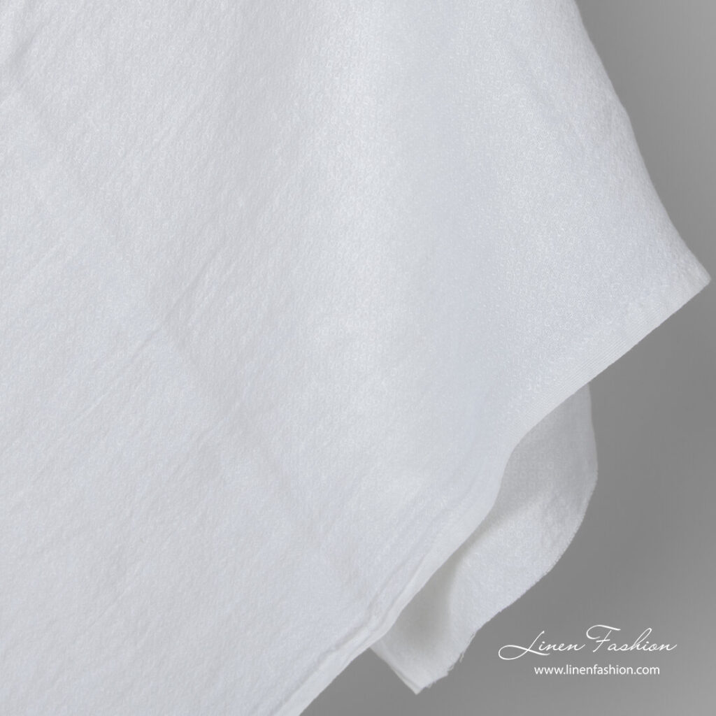 Washed bright white linen fabric in small squares