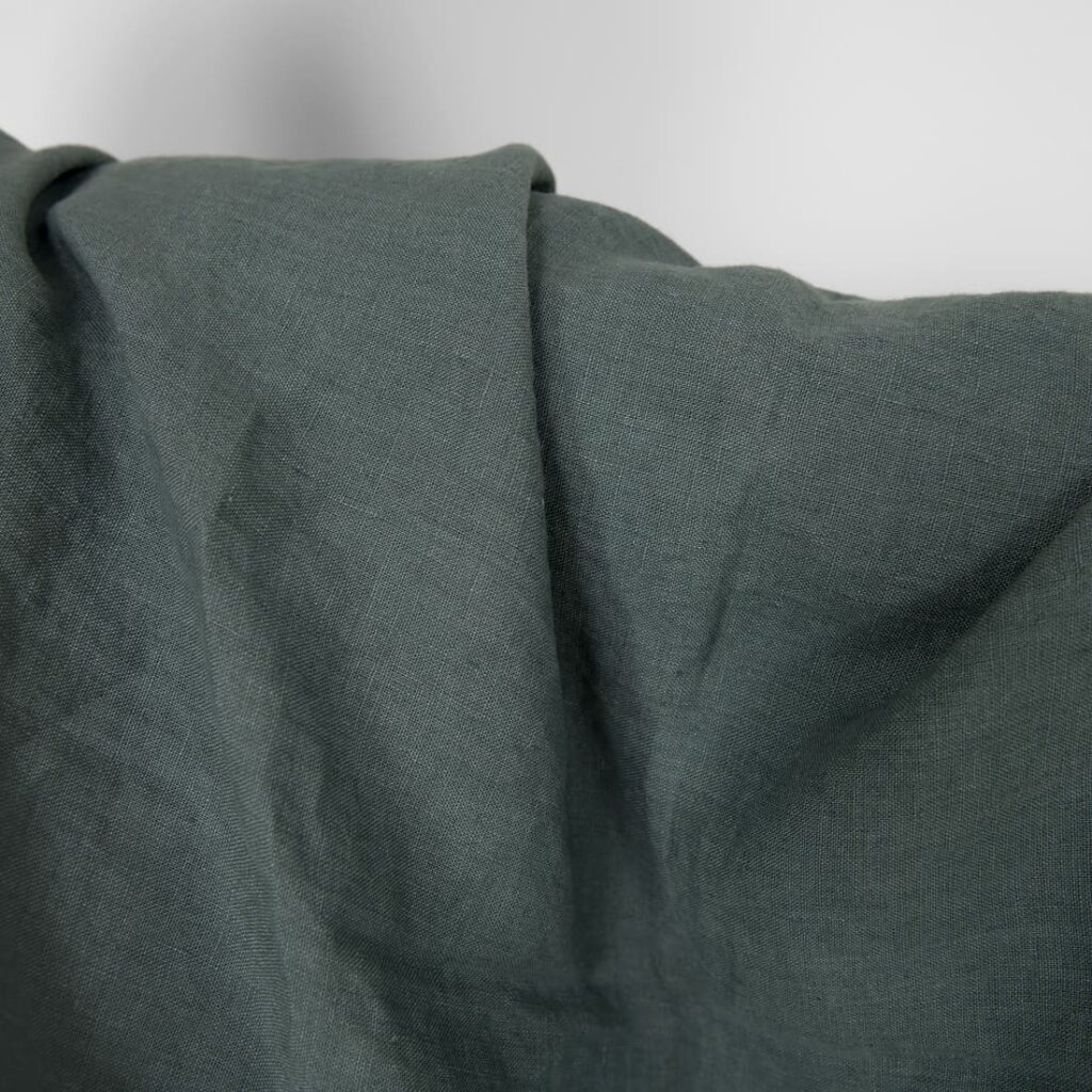 Washed linen fabric in balsam green colour, specially washed