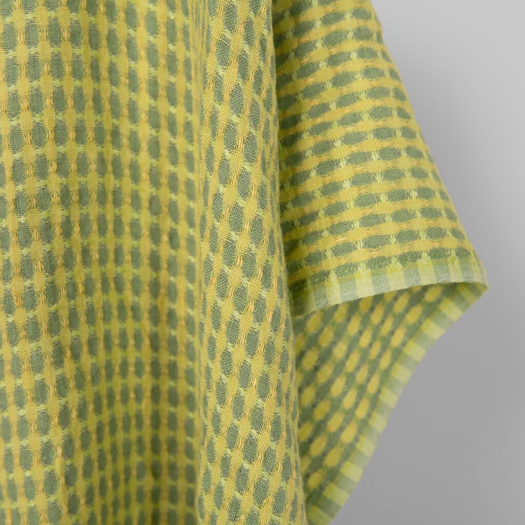 Washed linen fabric yellow and green pattern, fabric edge