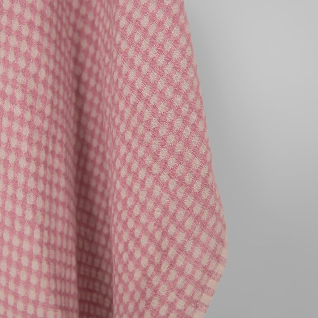 Washed linen fabric in greyish lilac structural weave pattern