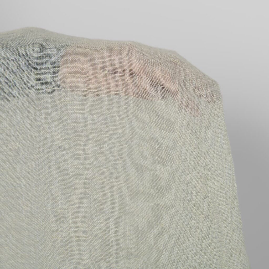 Washed linen fabric greenish grey melange, transparent