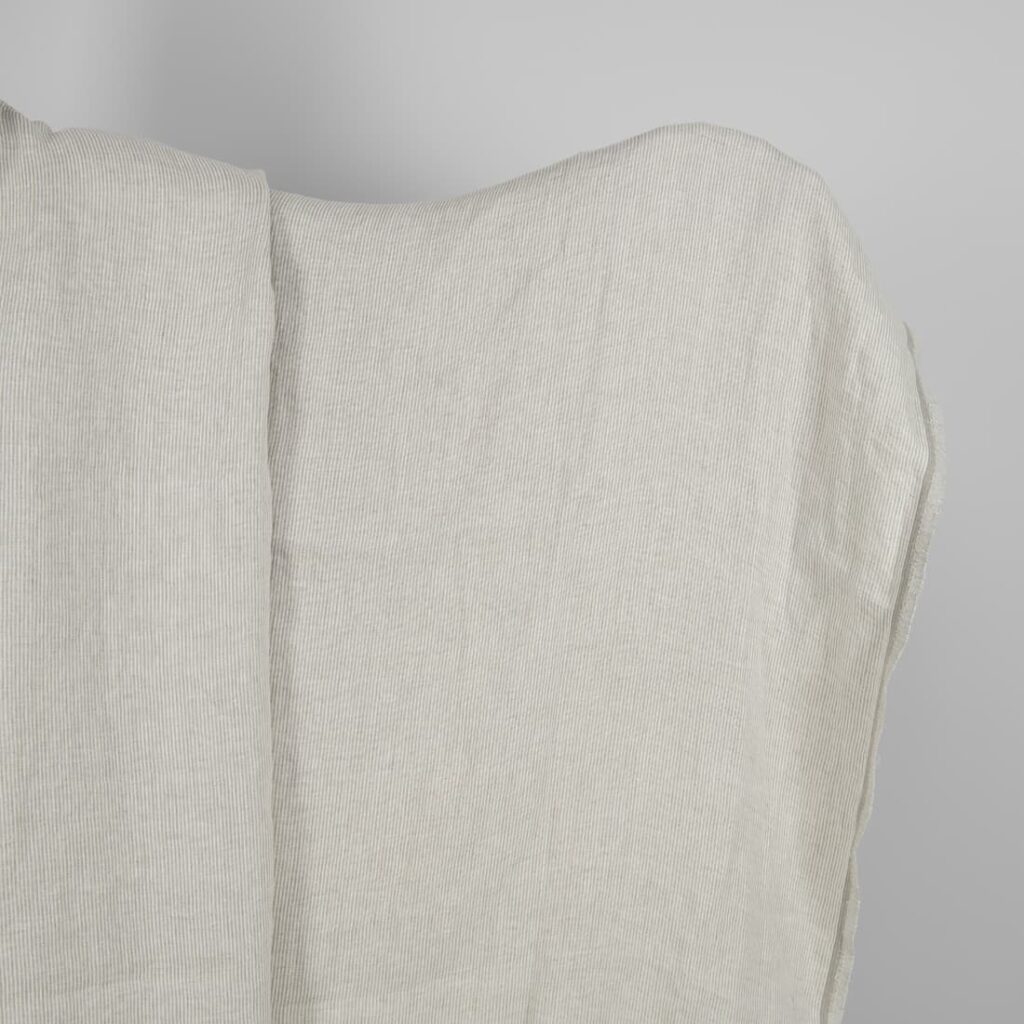 Washed linen fabric in natural and white colour stripes