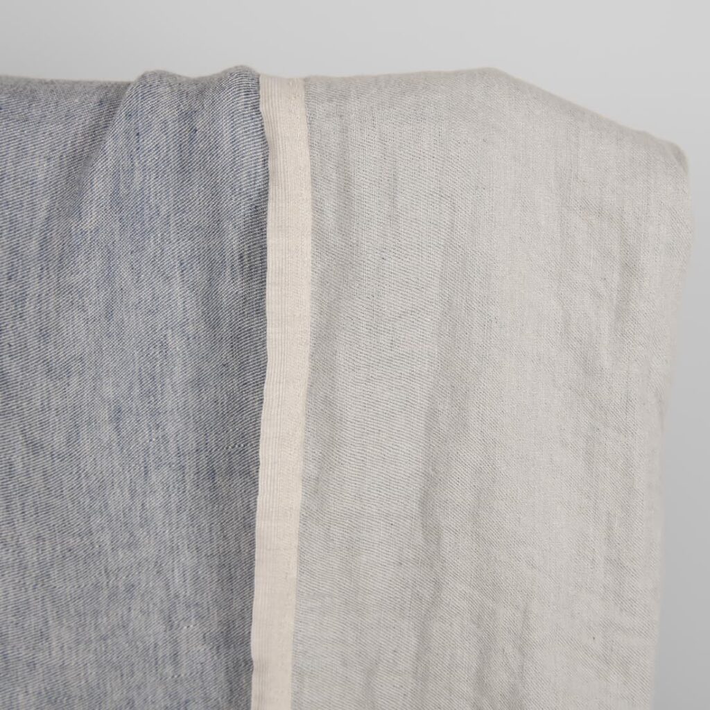 Washed linen fabric blueish grey colour double-sided detail close view