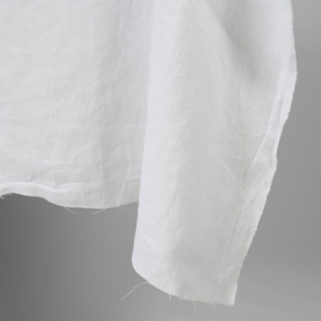 Linen washed fabric optic white colour edge view photo