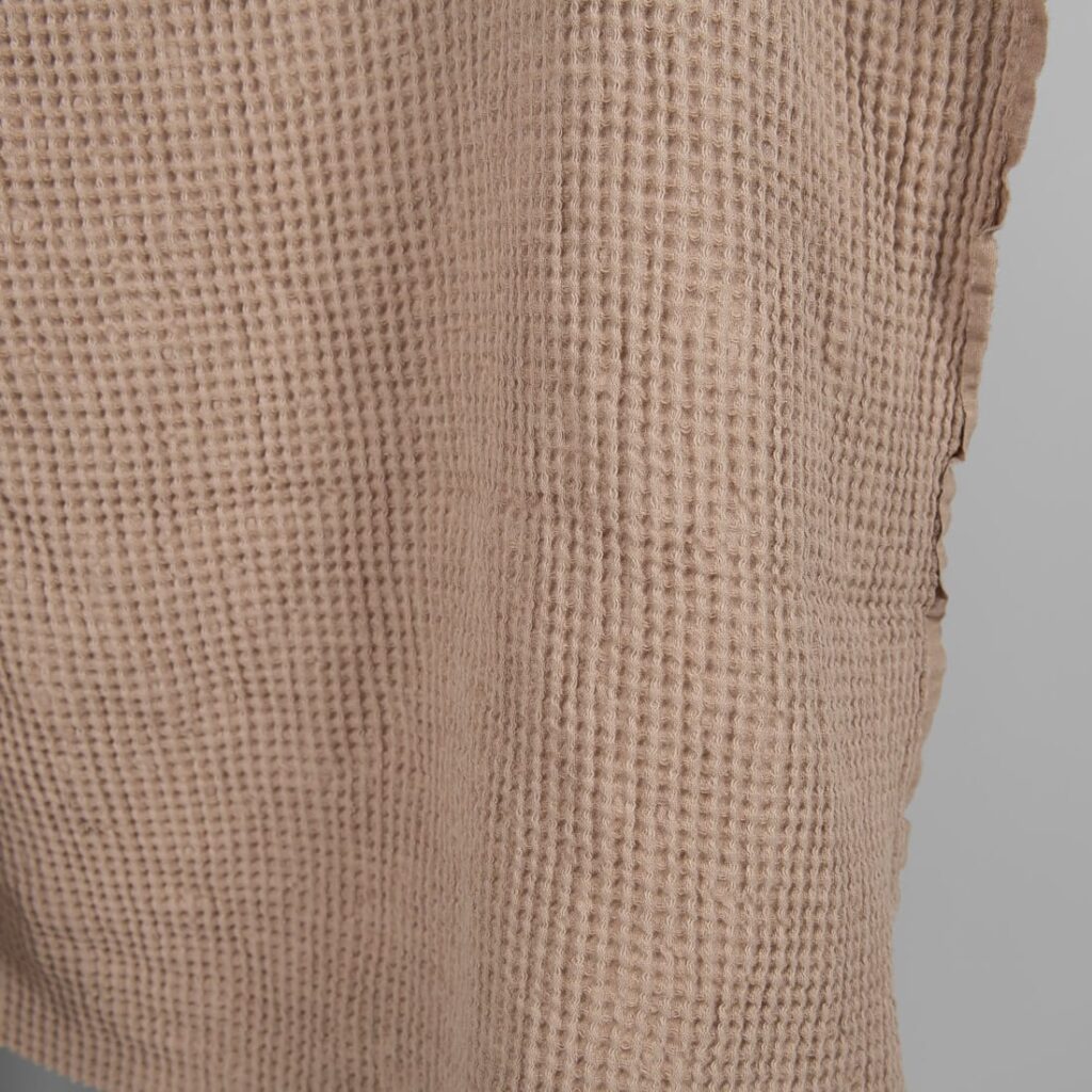Washed linen cotton fabric light brown waffle edge view