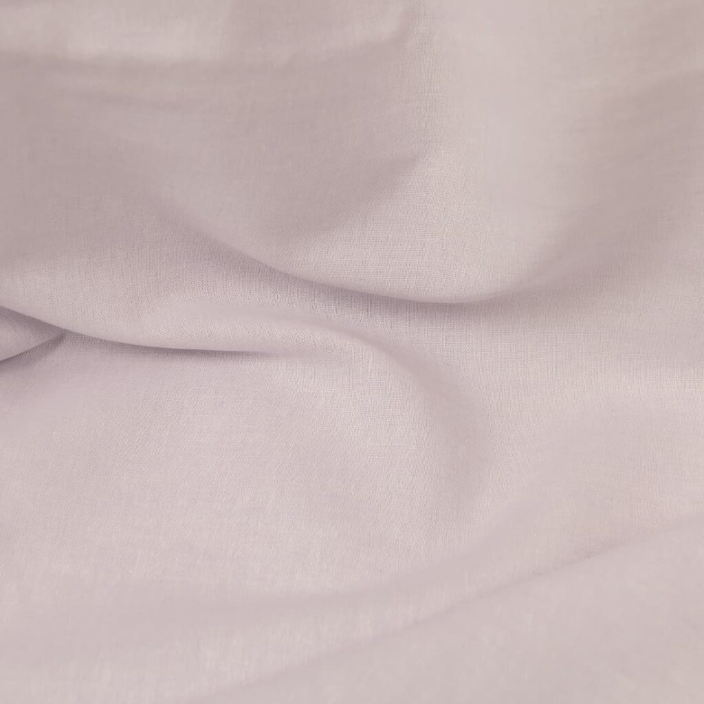 Wide linen cotton fabric lilac colour close up detail