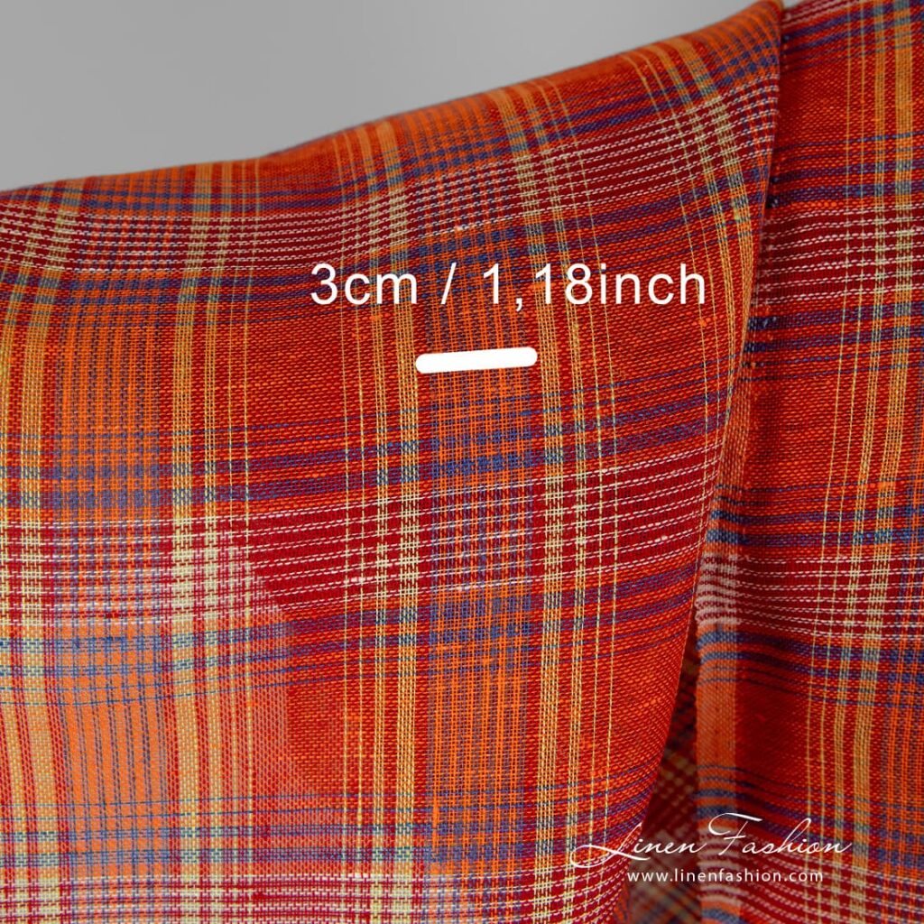100% linen fabric in red orange checks.