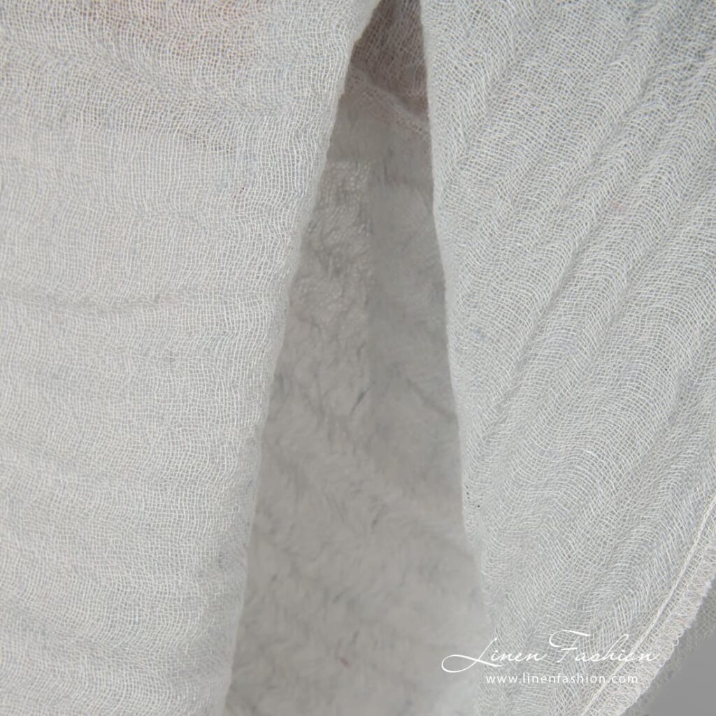 Washed pale green fabric.