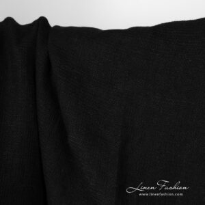 Washed linen fabric solid black waffle close up detail