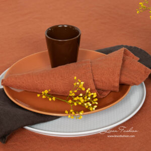 Washed linen napkin in brick color