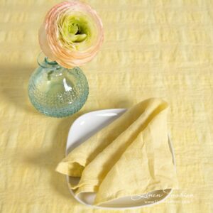 PORTO yellow linen napkin in openweave checks woven from yellow and greenish yellow yarns