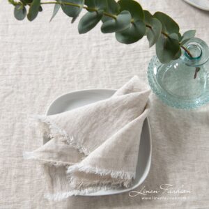 Light grey linen napkin in plain weave pattern