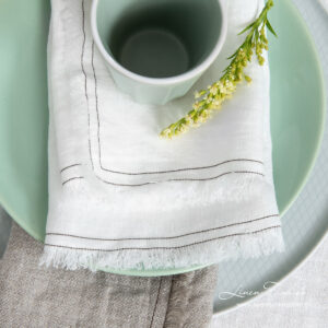 Washed white linen napkin with fringes and double stitch