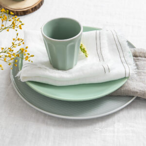 Off white linen napkin with fringes and double stitch around, washed