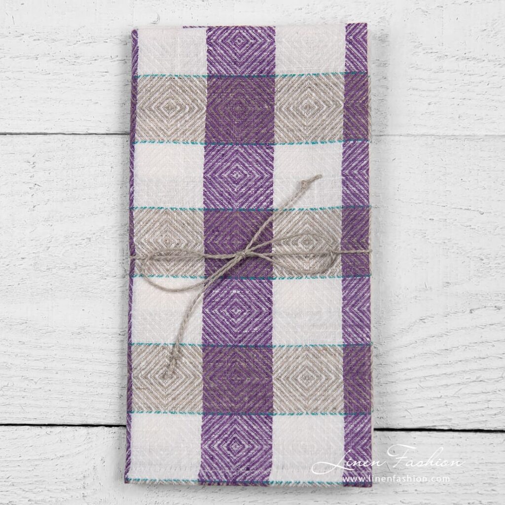 Linen kitchen towel in rhombuses and checks