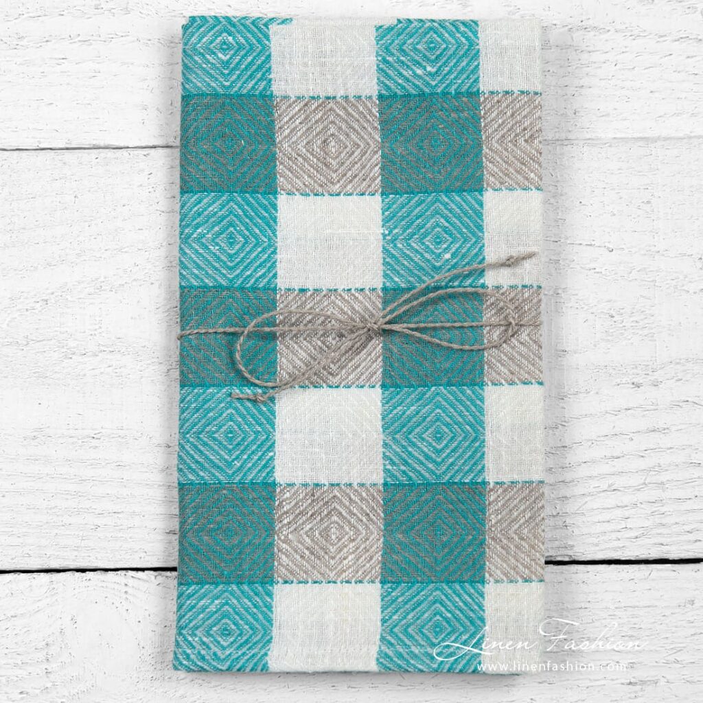 Linen kitchen towel in rhombuses and checks