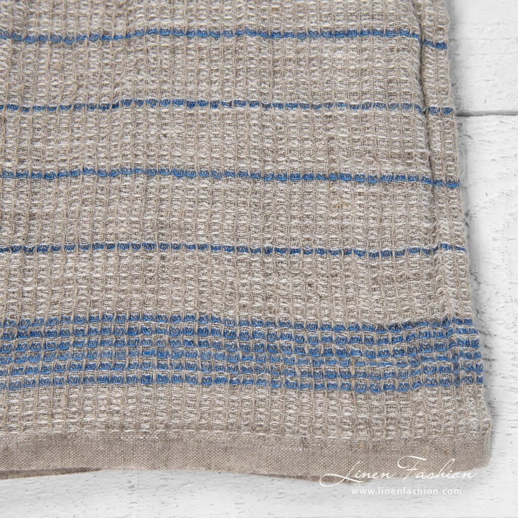 Light grey kitchen towel with blue stripes