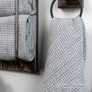 Waffle pattern gray bathroom towel with black stripes