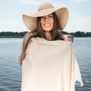 Beach towel is woven from light sand and white color yarns