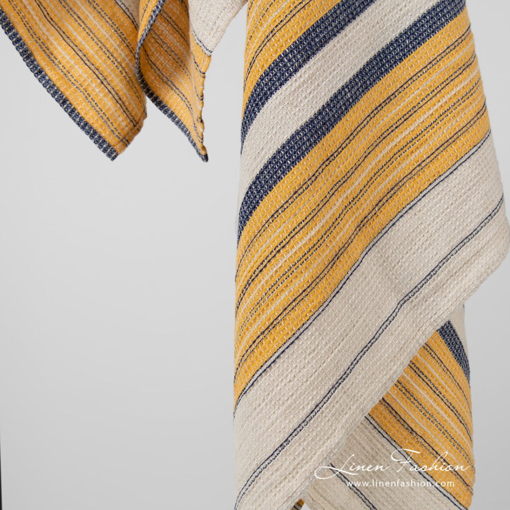 Linen cotton beige striped bath towels, waffle design.