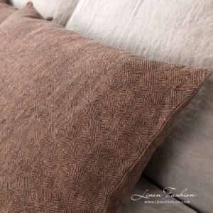 Linen cushion cover in brown color.