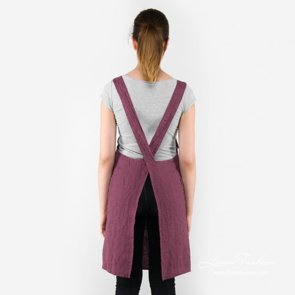 Dark red colored linen apron, meida.
