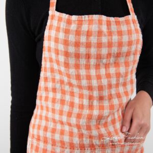 100% linen apron in orange.