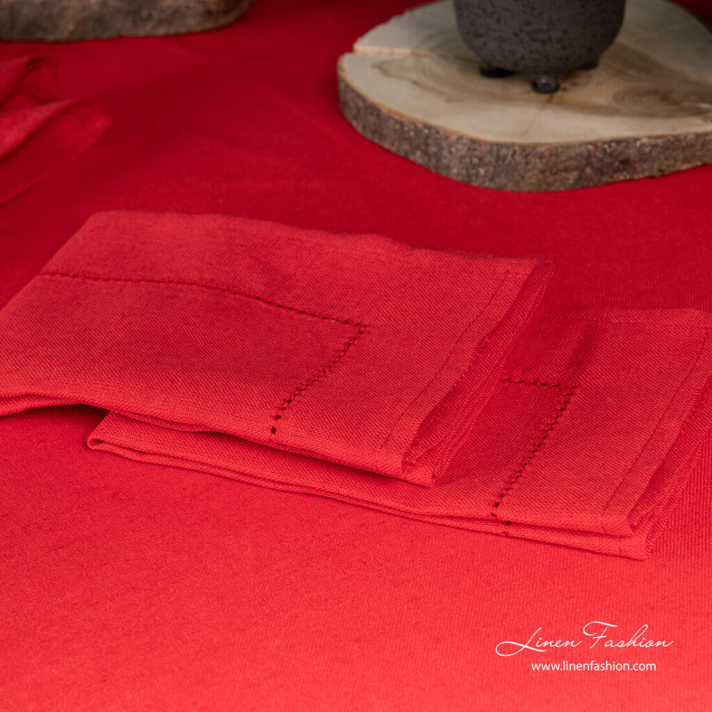 Red linen blend napkin decorated with hemstitch