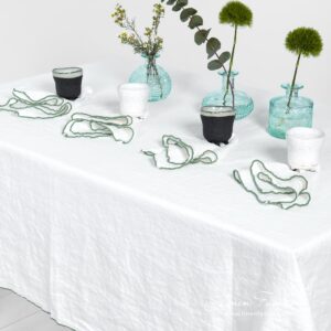 ARVO white linen tablecloth with green border