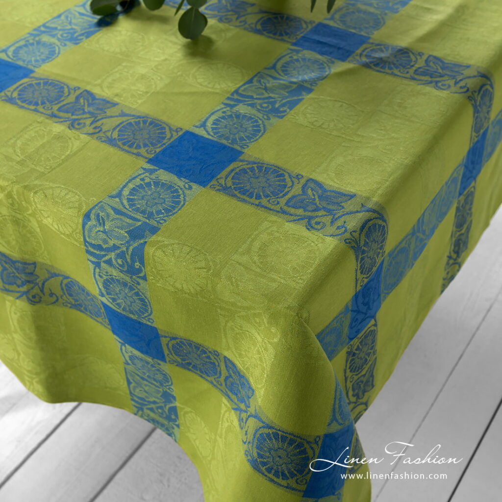 Linen cotton Jacquard tablecloth green blue with flower motifs.
