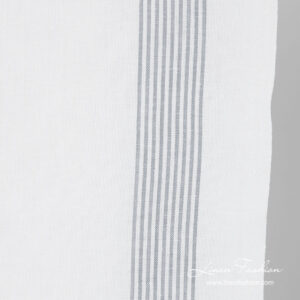 Thin grey striped edge of toweling fabric