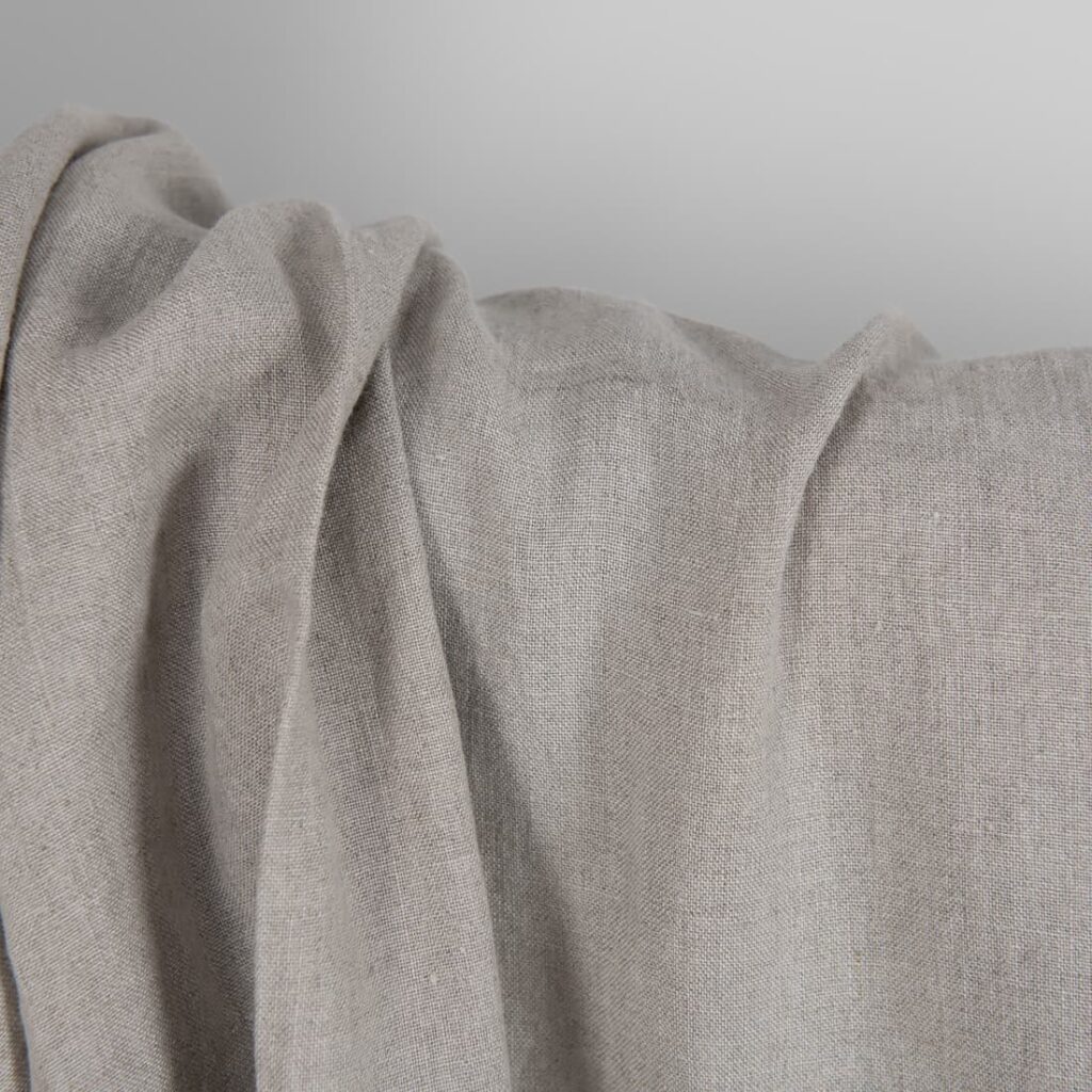 Washed linen fabric in natural grey texture