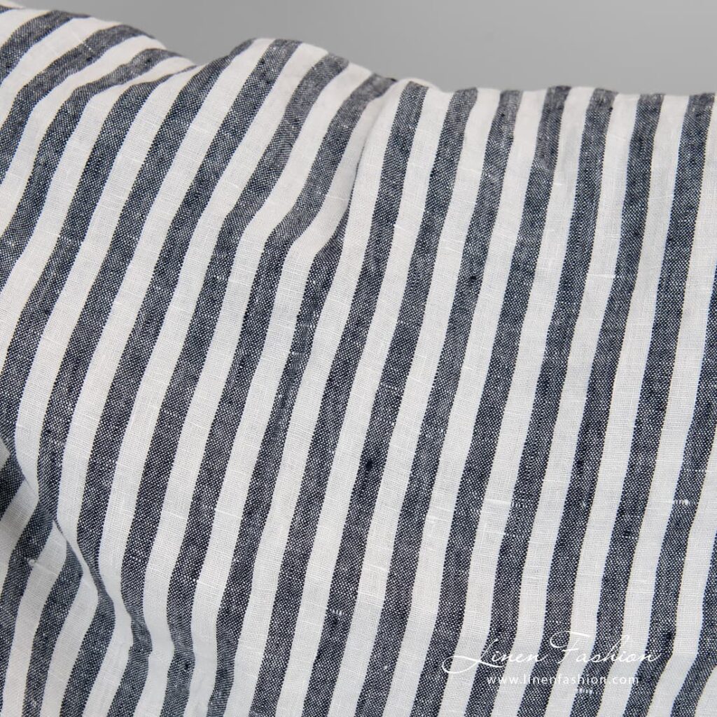 100% linen fabric in navy stripes, washed.