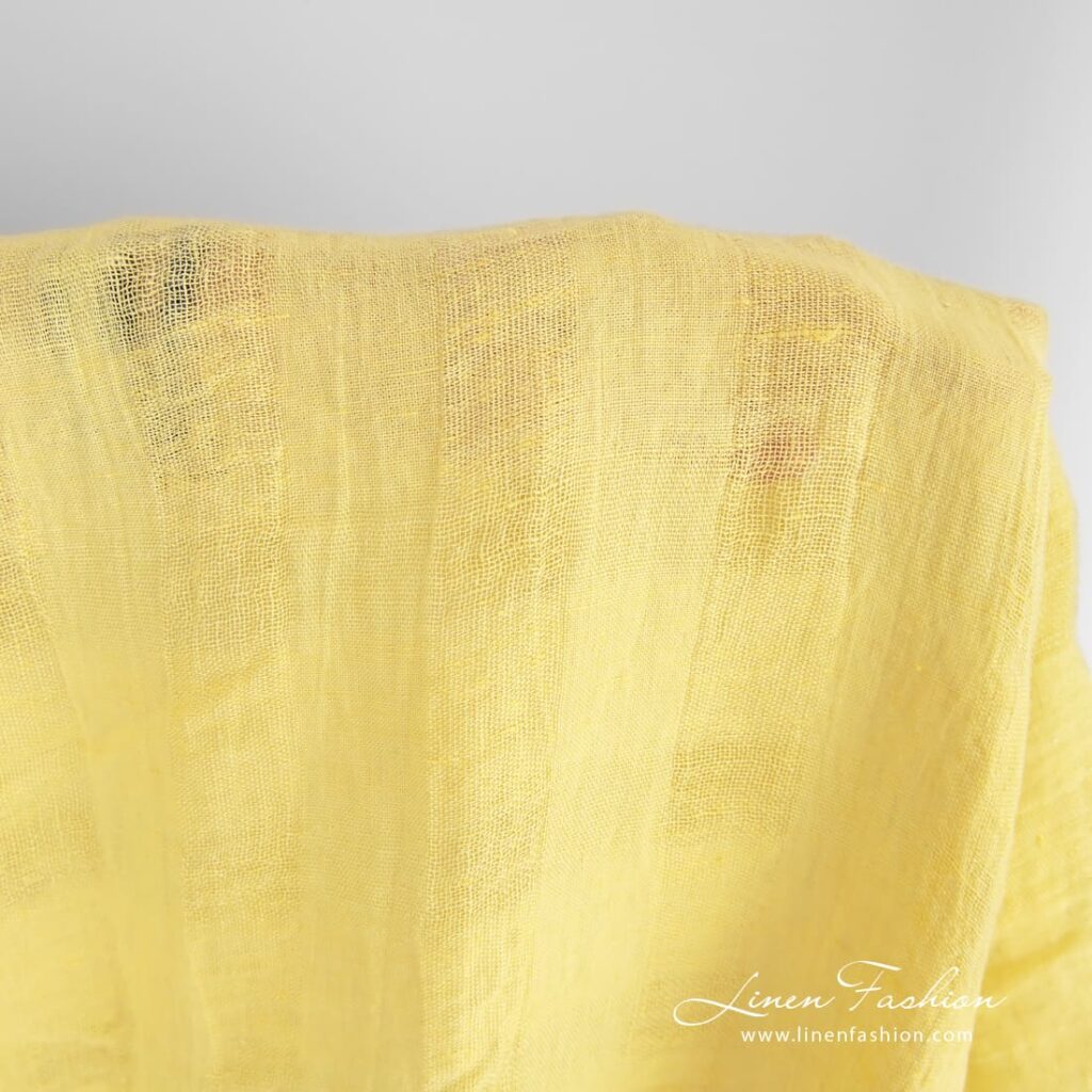 Yellow linen fabric, specially washed to increase softness