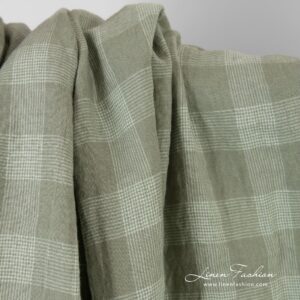 Linen fabric in green checks, specially washed to increase softness
