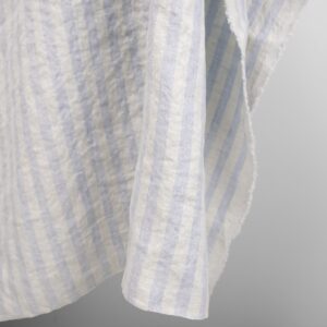 Praná ľanová látka vo vanilkových a svetlomodrých prúžkoch