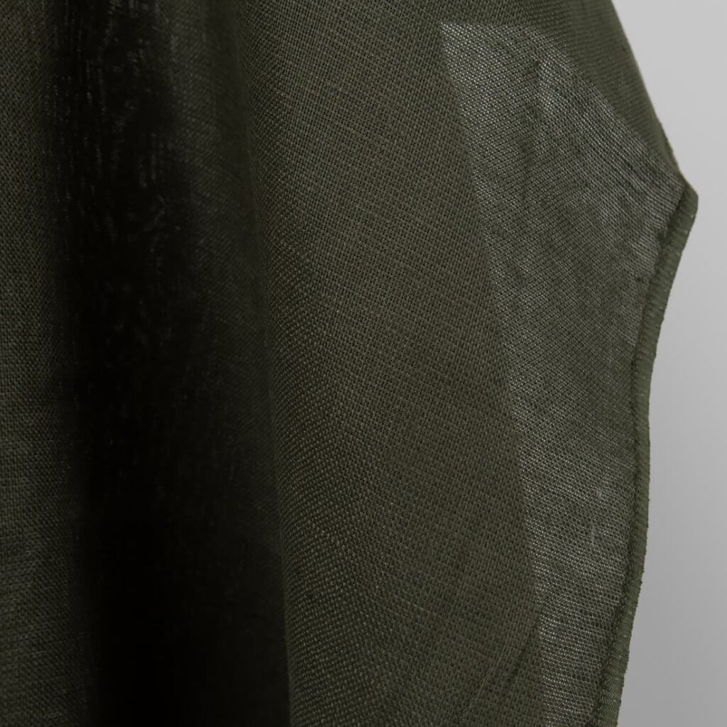 moss green linen fabric, with selvedge.