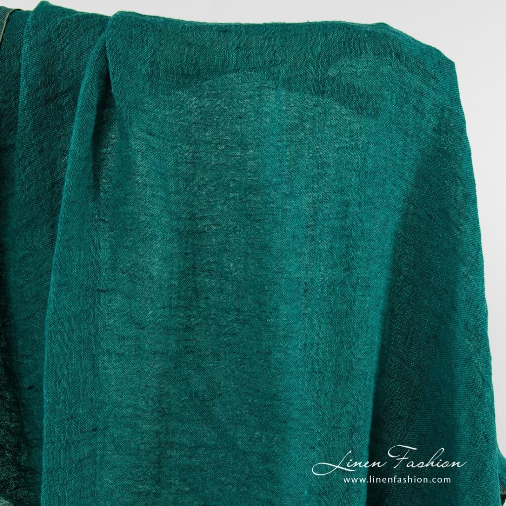 Washed gauze linen fabric in teal green.