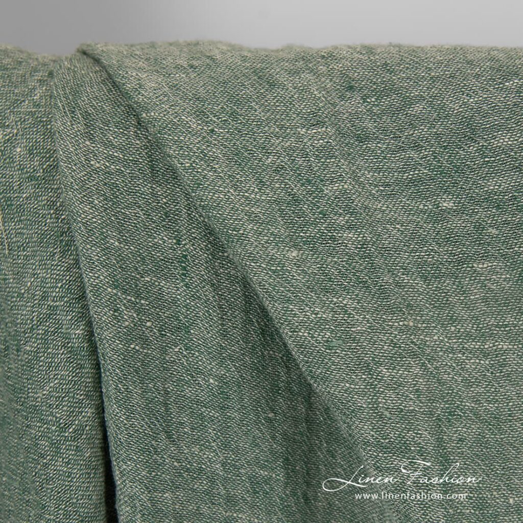 Transparent linen fabric in green colour.