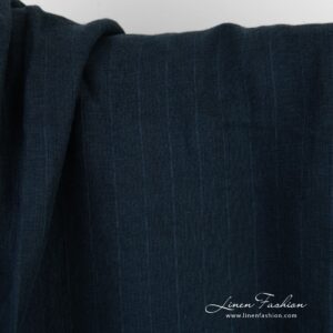 Dark blue linen fabric in stripes, specially washed to increase softness