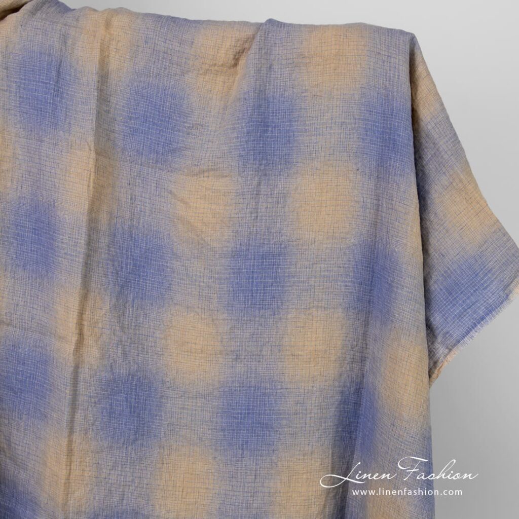 Checked linen fabric in blue and yellowish brown color