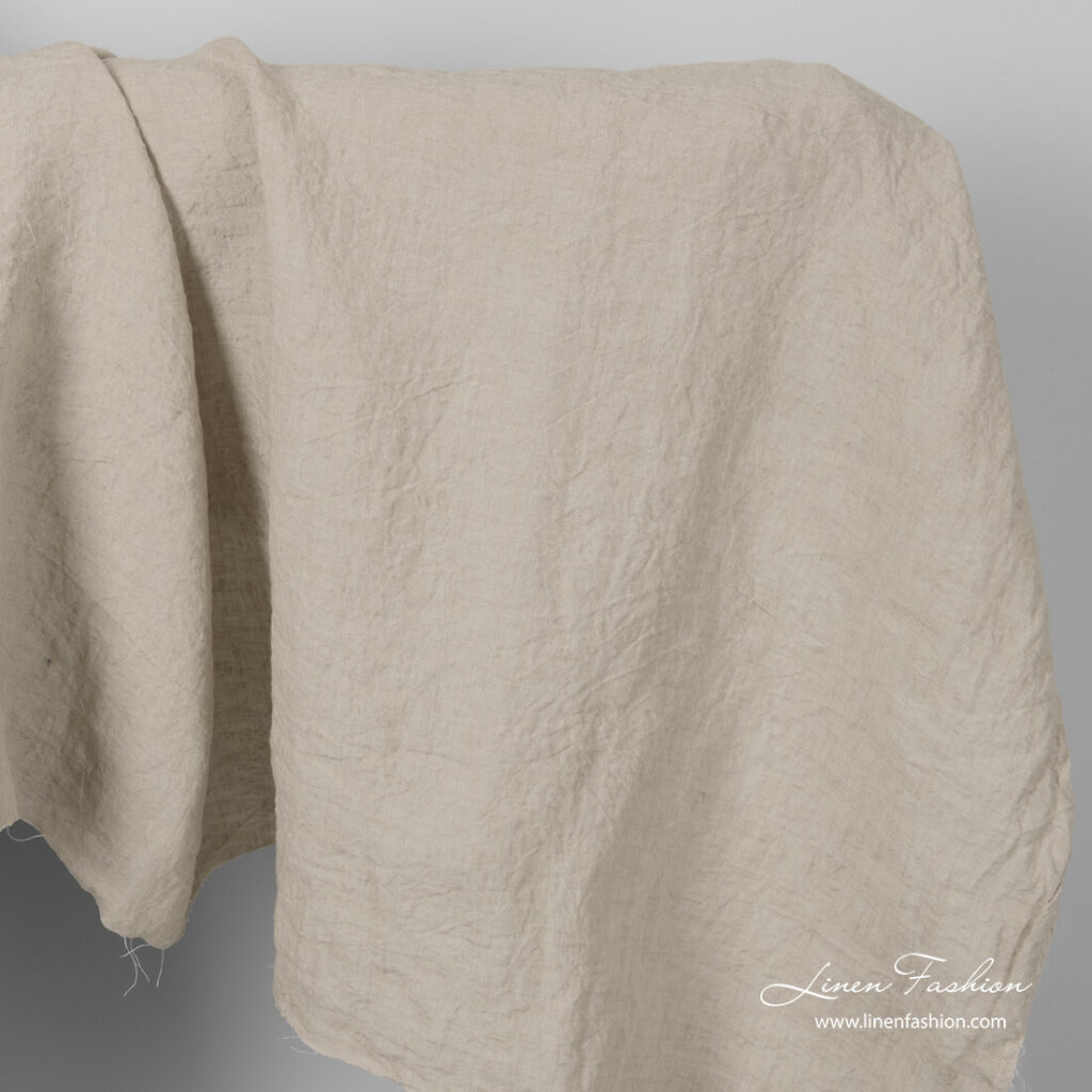 Wide linen fabric in sand colour, washed