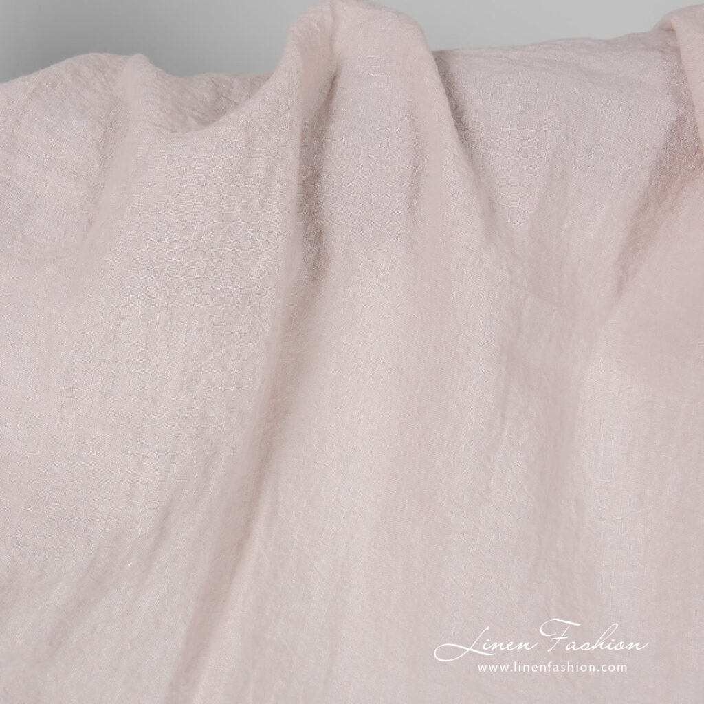 Wide light pink linen fabric, washed