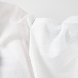 White linen fabric with red lines texture