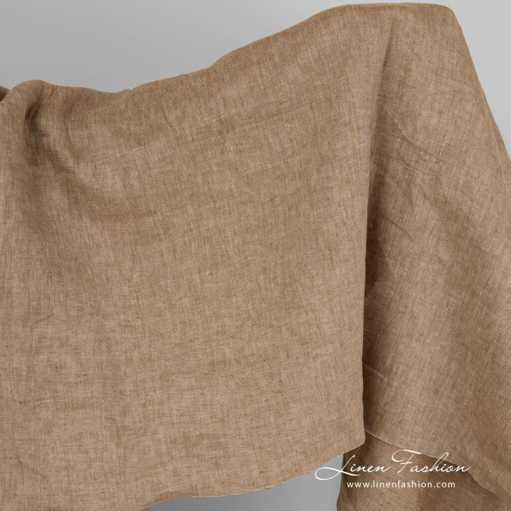 Linen fabric in brown melange colour, wide.