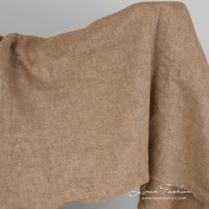 Linen fabric in brown melange colour, wide.